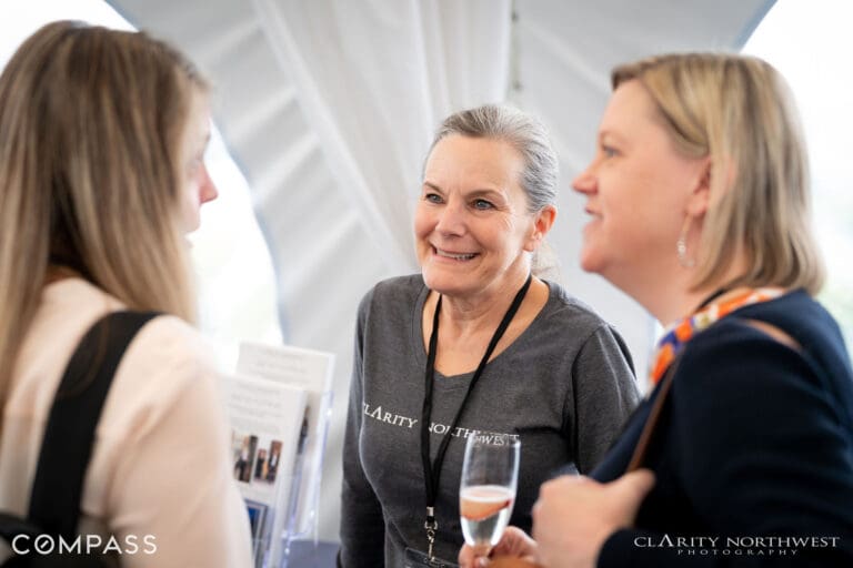 Networking event with engaged participants, showcasing a professional atmosphere in a Pacific Northwest setting.